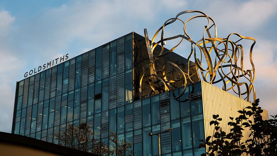 Sunshine hits the Ben Pimlott Building and its squiggle sculpture. 