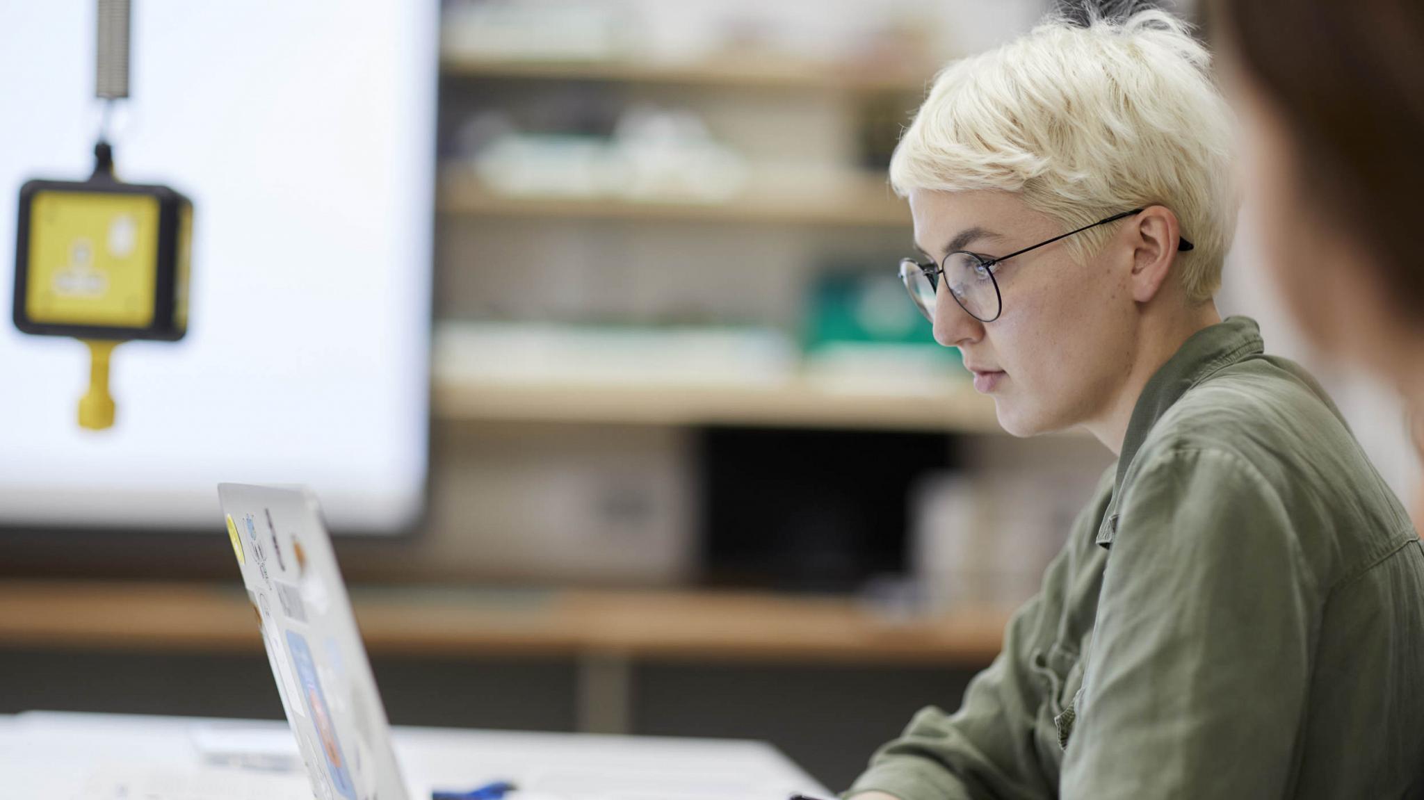 A student working on a computer.